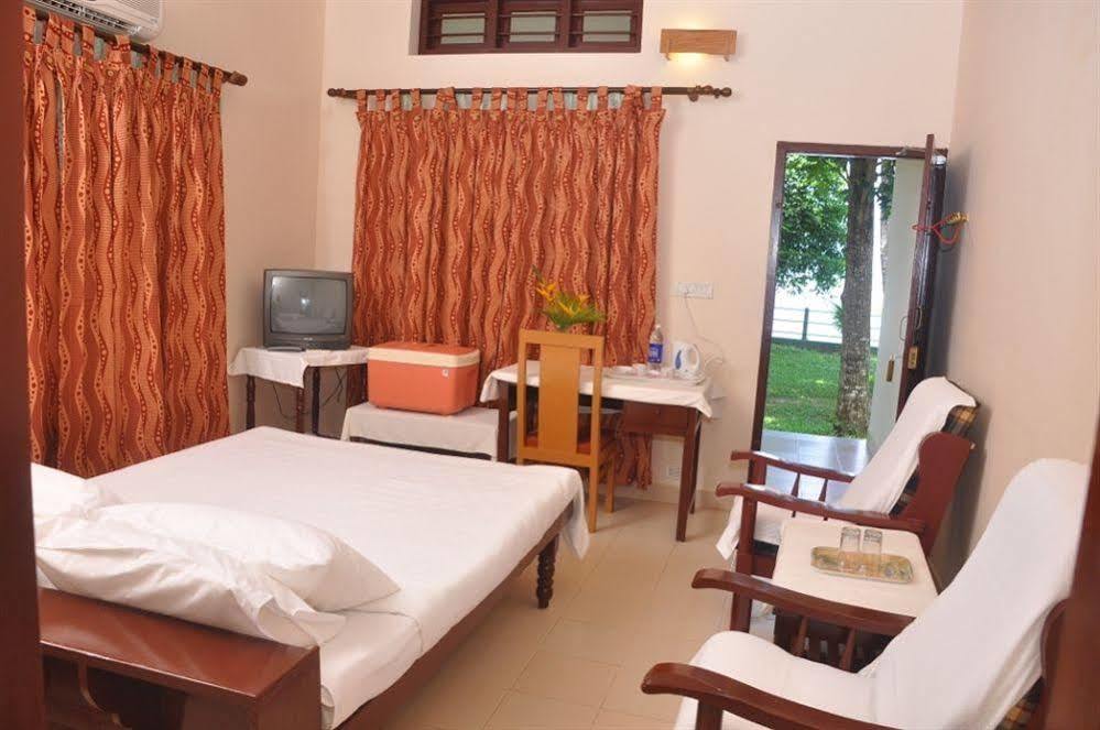 Illikkalam Lakeside Cottages Kumarakom Buitenkant foto